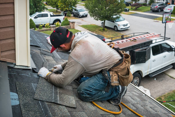 Professional Roofing technician working in Roberts, ID